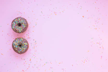 Beautiful donuts with chocolate glaze filling. Bakery sweets concept background.の写真素材