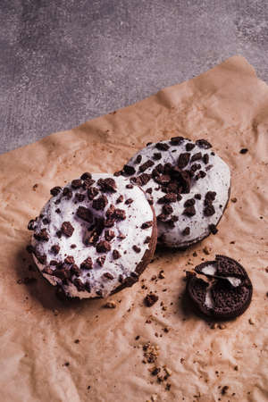 Beautiful donuts with chocolate glaze filling. Bakery sweets concept background.の写真素材