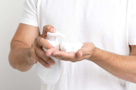 Man puts shaving foam on his hand. Shave concept.の写真素材