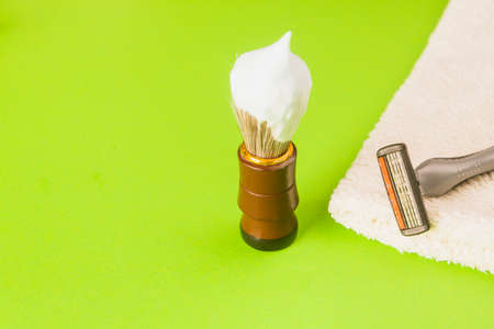 Shaving tools: brush, foam, shaver.の写真素材