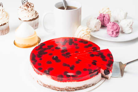 Ð¡ake with chocolate decoration on a plate. Wooden background. Copy space. Chocolate birthday cake...