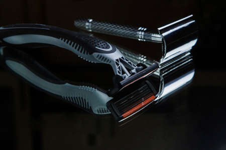 Various tools for the care of a beard and hairstyle. Scissors, razors, combs. Shaving concept....