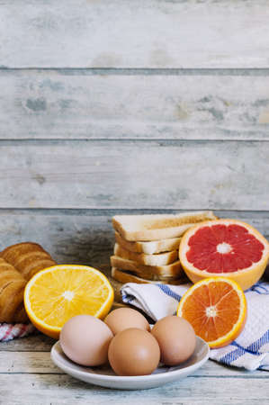 Healthy breakfast - orange, grapefruit, growing, and coffee. Bakeryの写真素材