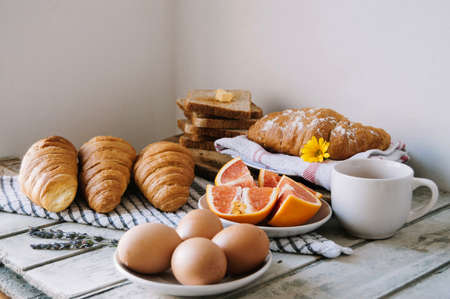 Healthy breakfast - orange, grapefruit, growing, and coffee. Bakeryの写真素材