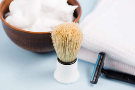 Shaving tools: brush, foam, shaver.の写真素材