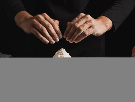 Beat flour and kitchen utensils, a baking dish, a rolling pin with eggs on the table. Baking,...