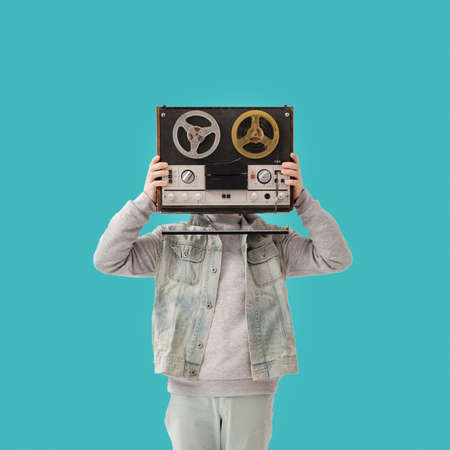 Young boy with cassette. High quality photo