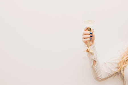 A person taking a selfie. woman holding glass champagne. High quality photo