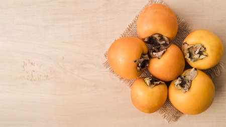 top view tasty persimmons with copy space. Resolution and high quality beautiful photoの写真素材