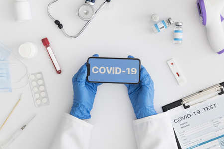 top view doctor holding a mobile phone. Resolution and high quality beautiful photo