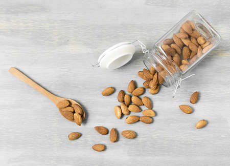 top view almonds jar with spoons. Resolution and high quality beautiful photoの写真素材