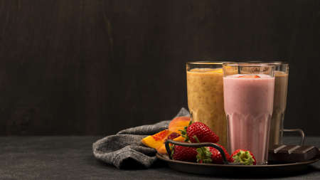 selection milkshake glasses with fruits chocolate. Resolution and high quality beautiful photoの写真素材