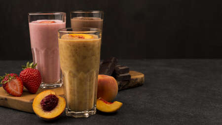 selection three milkshake glasses with chocolate fruits. Resolution and high quality beautiful photoの写真素材