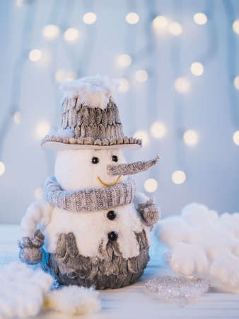 small toy snowman white table. Resolution and high quality beautiful photoの写真素材