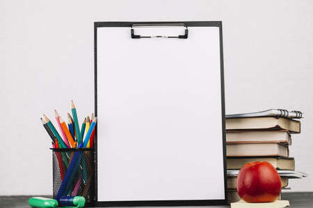 school supplies around easel. Resolution and high quality beautiful photoの写真素材