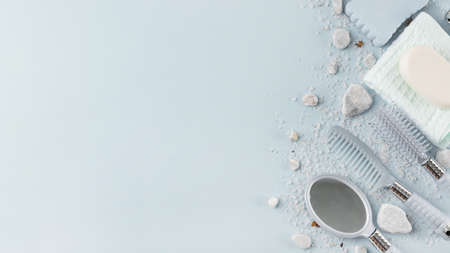 spa products with hair brushes blue background. Resolution and high quality beautiful photoの写真素材