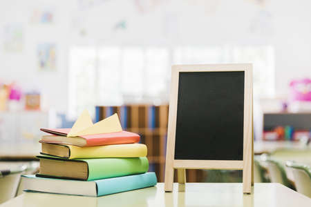 small chalk board books desk. Resolution and high quality beautiful photoの写真素材