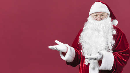 santa claus showing something with hands. Resolution and high quality beautiful photoの写真素材