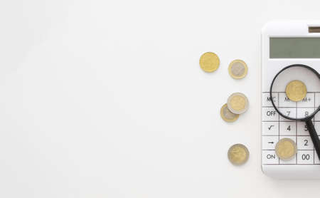 magnifier calculator with copy space coins. Resolution and high quality beautiful photoの写真素材