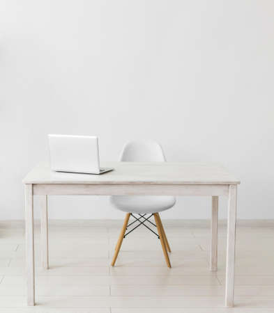 minimalist office with table laptop. Resolution and high quality beautiful photoの写真素材
