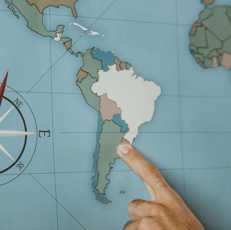 person pointing south america map. Resolution and high quality beautiful photoの写真素材