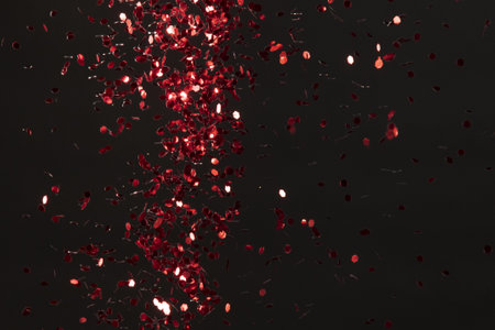 red glitter on black background. Resolution and high quality beautiful photoの写真素材