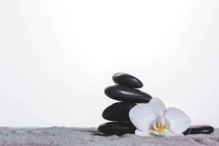 orchid stones gray towel. Resolution and high quality beautiful photoの写真素材