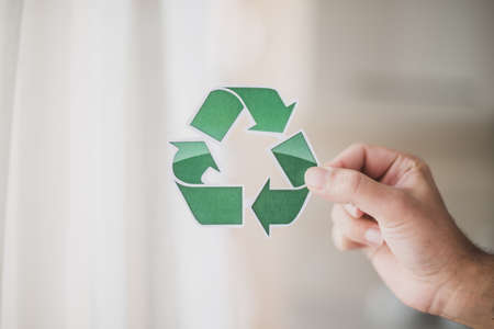 man s hand showing recycle icon. Resolution and high quality beautiful photoの写真素材
