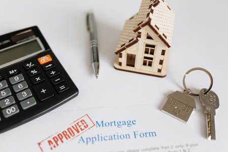 mortgage contract house figurine. Resolution and high quality beautiful photoの写真素材