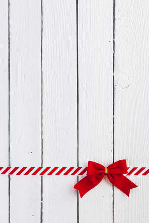 red gift bow with ribbon table. Resolution and high quality beautiful photoの写真素材