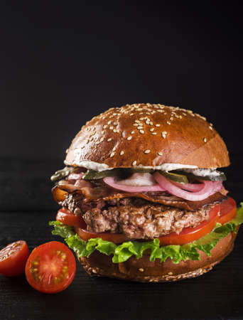 ready be served classic hamburger with cherry tomatoes (1). Resolution and high quality beautiful photoの写真素材