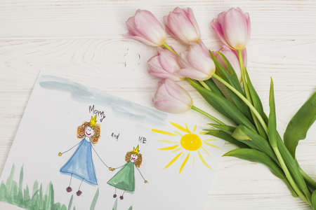 kid drawing mother daughter with flower. Resolution and high quality beautiful photo
