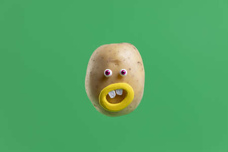 funny potato with face sticker. Resolution and high quality beautiful photoの写真素材