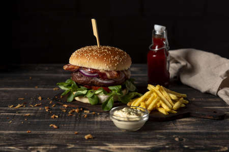 high angle burger with fries sauces table. Resolution and high quality beautiful photoの写真素材