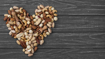 heart shape form made from nuts copy space. Resolution and high quality beautiful photoの写真素材
