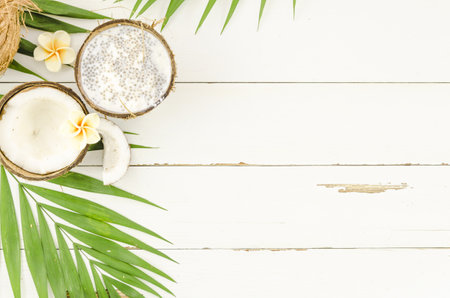 green palm leaves with coconuts wooden table. Resolution and high quality beautiful photo