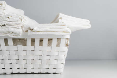 front view white basket with towels. Resolution and high quality beautiful photoの写真素材