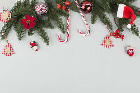 green fir tree branches with candy canes small toys. Resolution and high quality beautiful photoの写真素材
