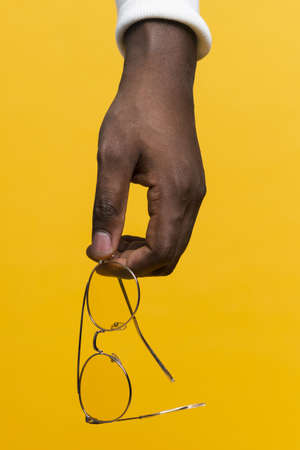 hand holding glasses. Resolution and high quality beautiful photoの写真素材