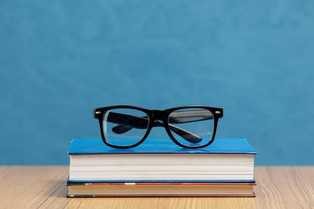 front view books with glasses. Resolution and high quality beautiful photoの写真素材