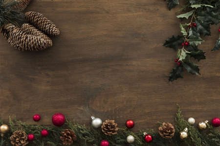 holly branches with cones on table. Resolution and high quality beautiful photo