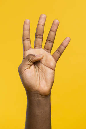 hand showing four fingers. Resolution and high quality beautiful photoの写真素材