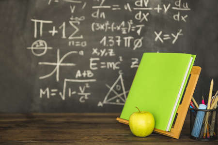 book holder with book stationery near blackboard. Resolution and high quality beautiful photoの写真素材