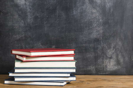 colorful books front blackboard. Resolution and high quality beautiful photo