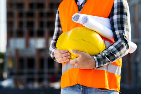 close up construction engineer holding helmet. Resolution and high quality beautiful photoの写真素材