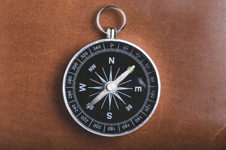 close up of compass on wooden background. Resolution and high quality beautiful photoの写真素材