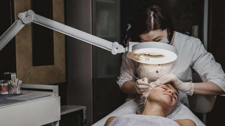 woman wellness center during skin treatment. High quality beautiful photo concept