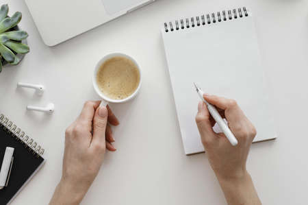 woman taking notes notepad. High quality beautiful photo conceptの写真素材