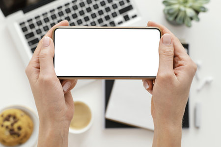 woman taking photo with her phone. High quality beautiful photo conceptの写真素材