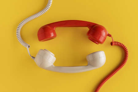 top view vintage telephone receivers with cord. High quality beautiful photo conceptの写真素材